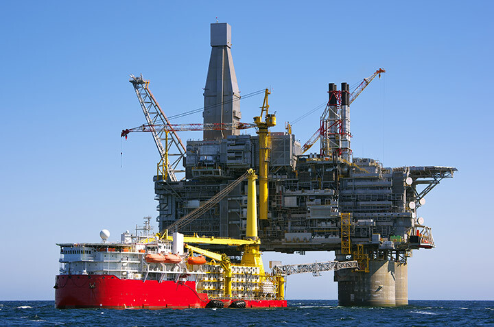 Offshore oil rig with oil tanker